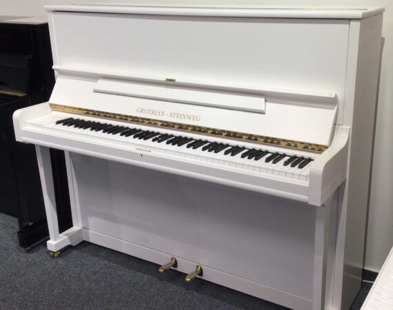 gebrauchtes weißes Klavier